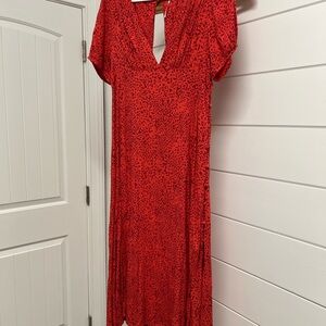 Free People above the ankle dress. Side buttons all the way down.